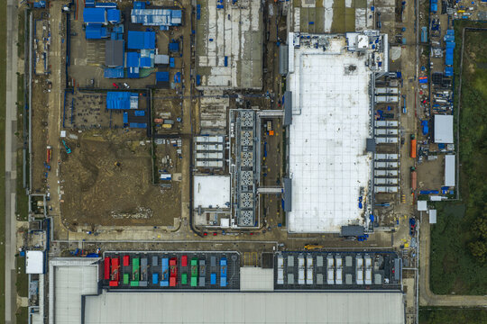 Aerial view of large scale ai data center facility and support structures under construction, representing technology growth, Beijing, China