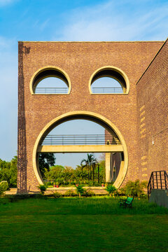 Modern Red Brick Academic Architecture with Circular Geometric Design at IIM Kashipur Campus