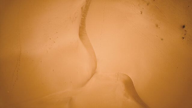 Aerial view of the arid landscape revealing earth tones and subtle textures, Zigindi, Yobe, Nigeria.
