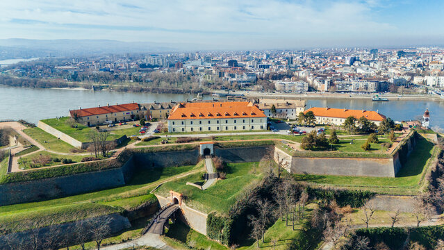 Aerial view of the Petrovaradin Fortress with its red-tiled roofs and formidable green ramparts overlooking the Danube River, Petrovaradin, Vojvodina, Serbia.
