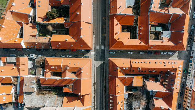 Aerial view of terracotta roofs meeting at right angles, the streets cutting through the urban landscape, Petrovaradin, Vojvodina, Serbia.