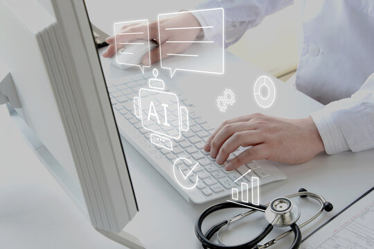 対話型AIを使いながらパソコンで仕事をする医師