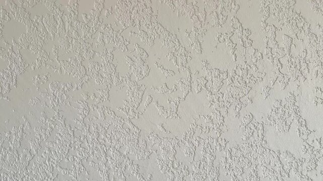 White plastered wall with rough texture background