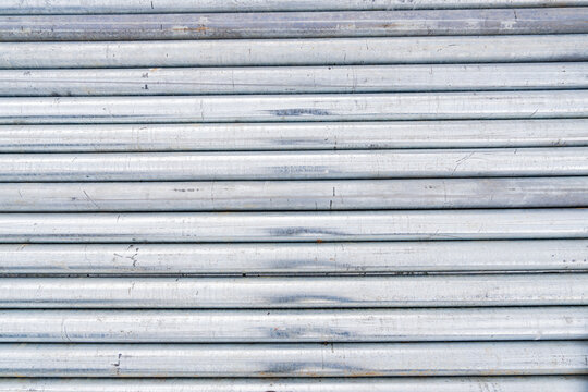 Stainless steel metal pipes texture, metal lines texture, metal texture, background with pipes, water pipes, metal pipes industry. background texture