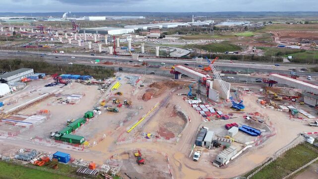 Aerial view of the HS2 Water Orton Central construction site with heavy machinery, concrete structures, and ongoing work, Birmingham, United Kingdom.
