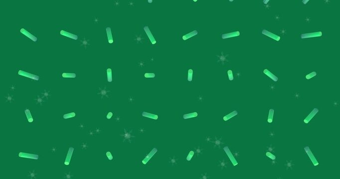 Animation of snowflakes falling over 3d structures in seamless pattern against green background