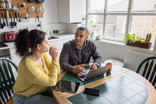 Roomies having Casual Conversation Over Coffee