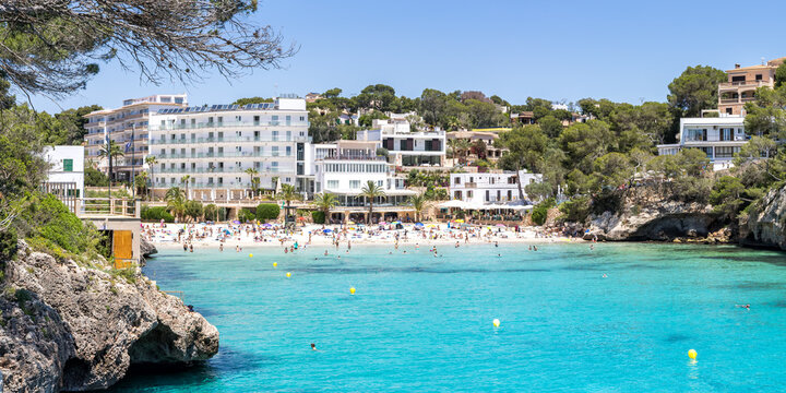 Beach Playa de Cala Santany&iacute; on Mallorca island holiday by the sea panorama in Spain