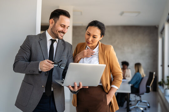 Success group of multiethnic entrepreneurs and business people achieving goals in corporate office