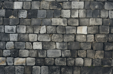 Obraz premium Processed collage of old european cobble stone pavement texture. Background for banner.