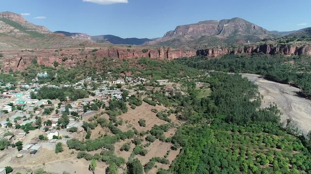 Aerial Drone Transition from May Lomin River Valley to Abyi Adi Town, Tigray, Ethiopia