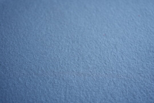 pale Blue fleece fabric texture background Soft blue fleece fabric texture background with smooth fibers and cozy appearance. Perfect for winter, textile, clothing, warmth, comfort, and background des