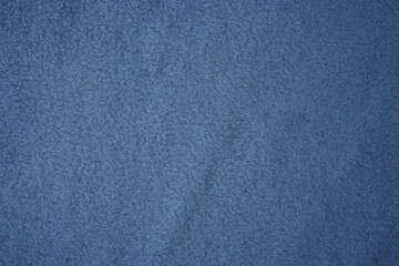 pale Blue fleece fabric texture background Soft blue fleece fabric texture background with smooth fibers and cozy appearance. Perfect for winter, textile, clothing, warmth, comfort, and background des © Анна Климчук