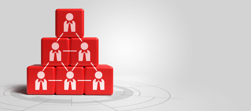 Red cubes with human figure icons stacked in a pyramid shape, representing organizational structure, team management, and corporate leadership concepts