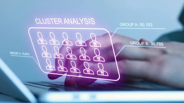 Cluster analysis being conducted on a laptop with data visualization display in a digital setting.