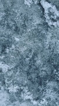 Minimalist blue ice and frost texture. Abstract winter background for graphic design, web or overlay. Natural frozen crystalline patterns with plenty of copy space for creative projects.