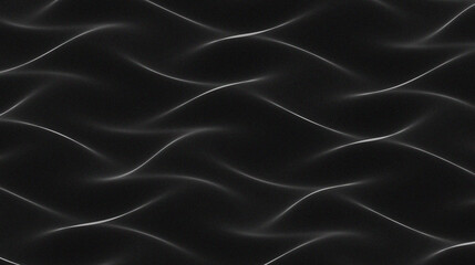 Fototapeta premium The black background with fine folds in the image creates the illusion of fabric falling or blowing dynamically in the wind.