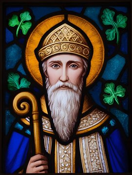 Saint Aidan of Lindisfarne glows with serene faith clutching his bishops crozier and halo