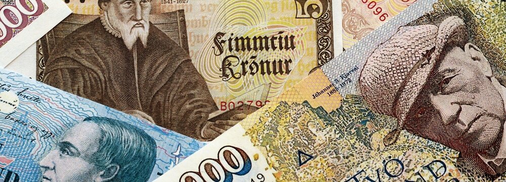 Icelandic krona money bills pile on table. Iceland banknotes of ISK currency close up. Concept of business, economy and banking in Iceland