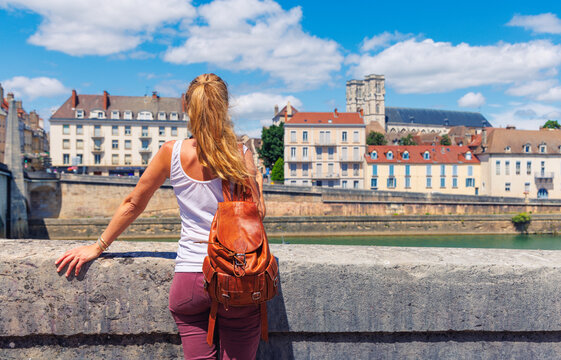 Female on brige in city of France, Chalon sur saone, Bourgogne, Saone et Loire, Burgundy