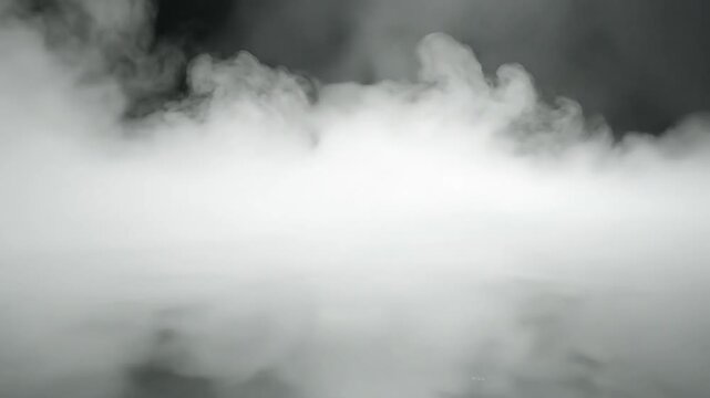 dramatic white smoke on dark background