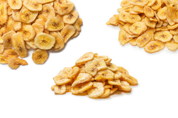 Fototapeta premium Banana chips isolated on a white background. Dehydrated banana.