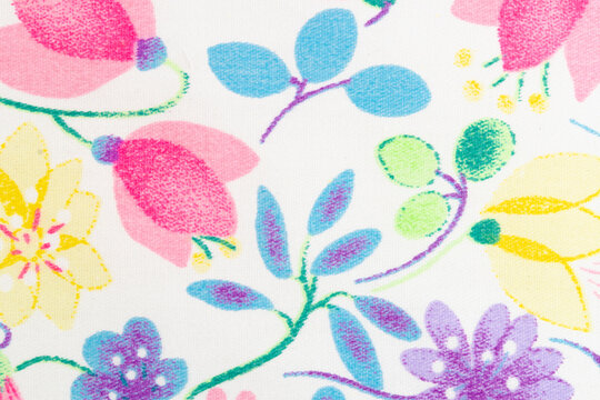 Fragment of colorful retro tapestry textile pattern with floral.