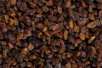 Obraz premium Macro top view of dried grapes, sweet organic raisins.
