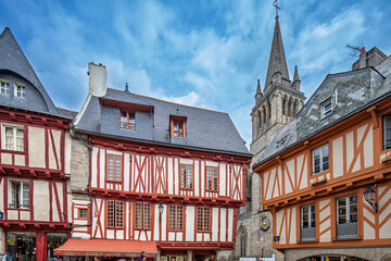 Fototapeta premium Vannes Henry IV Square: Historic Half-Timbered Houses, Cathedral Spire