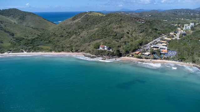Praia Brava in B&uacute;zios Rio de Janeiro Brazil with turquoise ocean and coastal neighborhood &ndash; tropical beach and seaside scenery