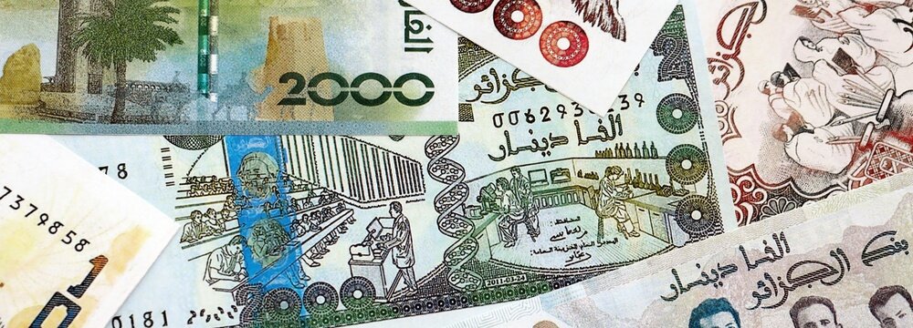 Algerian dinar paper banknotes pile on table. Algeria DZD currency money bills in big amount. Concept of economics, taxation and banking in Algeria