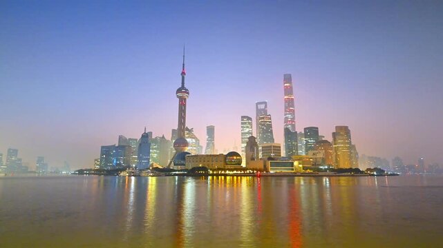 Shanghai skyline with Oriental Pearl Tower and Lujiazui financial district during sunrise and sunset, China. February 15, 2026