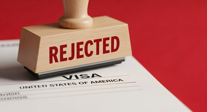 Rejected visa application stamp on U S visa form rubber united