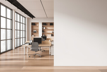 Obraz na płótnie Canvas Open office interior with desks and blank wall, minimal style on bright background, concept of workspace presentation. 3D Rendering