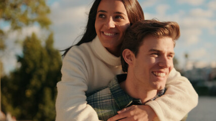 Fototapeta premium Happy Couple Embracing Outdoors in Warm Light