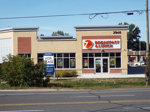 Ottawa, Ontario, Canada-July 21, 2025: The storefront of "7am Breakfast and Lunch" at 2948 Bank Street features bright signage and offers classic morning and midday meals.