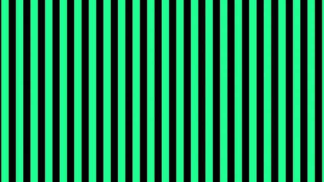 Colorful stripes moving in a pattern give a fun effect at an art display during a summer fair in New York City