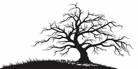 A solitary tree stands tall on a hill with bare branches reaching towards the sky. © Murad