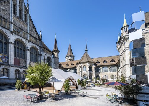 Inner courtyard, garden courtyard with tables and chairs, Swiss National Museum, Zurich, Switzerland