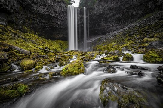 Waterfall cascading over rocky outcrop, Tamanawas Falls, long exposure, Cold Spring Creek, Oregon, USA