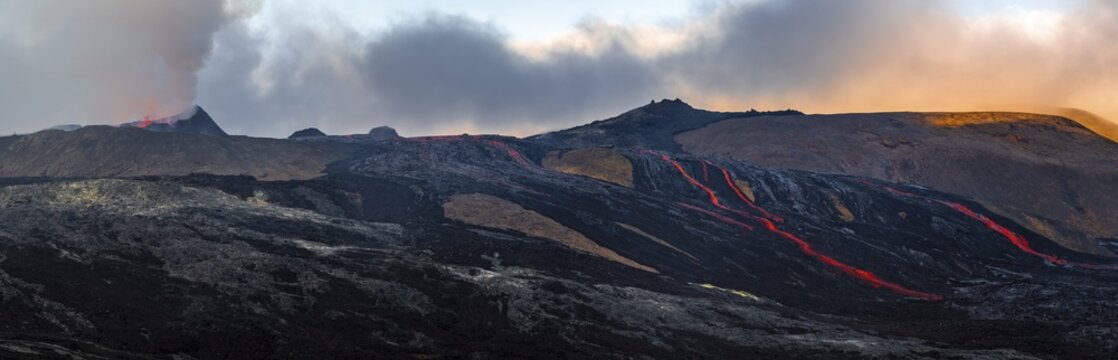 Erupting volcano with lava fountains and lava field, crater with erupting lava and lava flow, Fagradalsfjall, Kr&yacute;suv&iacute;k volcano system, Reykjanes Peninsula, Iceland