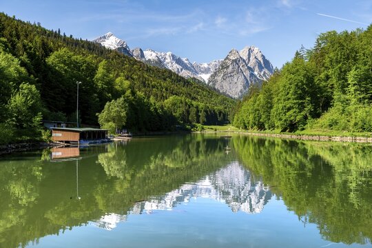 Mountains reflected in the lake, Rie&szlig;ersee, Schwarzenkopf peak in the back, Middle and Inner H&ouml;llentalspitze, Vorderer and Gro&szlig;er Waxenstein, Rie&szlig;, Garmisch-Partenkirchen, Wetterstein range, Werdenfelser Land, Alps, Upper Bavaria, Bavaria