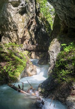 Bridge over a stream, mountain stream flowing through a narrow gorge, gorge with river, Wolfsklamm, Stans, Tyrol, Austria