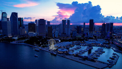 Fototapeta premium Sunset Skyline In Miami Florida United States. Amazing Skysrapers And Traffic On Street Viewed From Above. Sunset Sky Clouds Downtown Cityscape. Sunset Outdoors Famous. Miami Florida.
