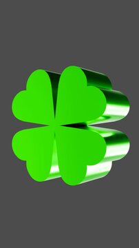 Rotating Metallic 3D Four Leaf Clover Shamrock on Dark Gray Background 4K 30FPS