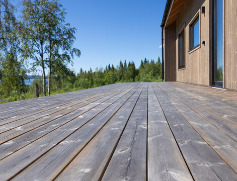 Wooden decking made from natural wood decking boards