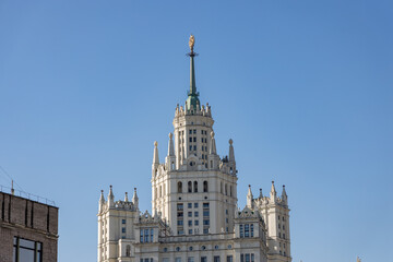 Russia. Moscow. March 16, 2026. Central tower of the Kotelnicheskaya Embankment skyscraper with balconies and architectural ornaments in spring light