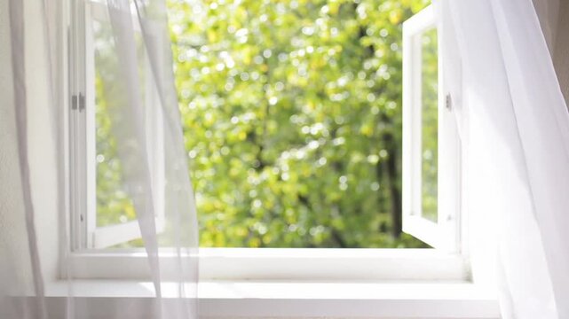 Wind curtains blown door window garden. open window swaying wind curtain living room summer morning sunshine. close up window into bedroom. fresh spring forest greenery view