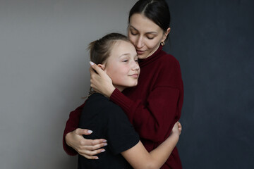 Naklejka premium Joyful mother and son indoor portrait