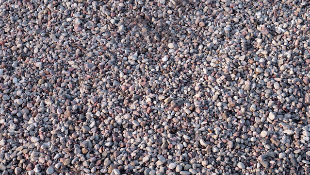 Dense Grey Gravel Surface For Construction, Compacted Foundation Material With Mixed Crushed Stones, Coarse Texture And Drainageready Substrate, Industrial Site Aesthetic Conveying